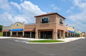 Exterior of a commercial building with lots of opportunity for perforated window film.  