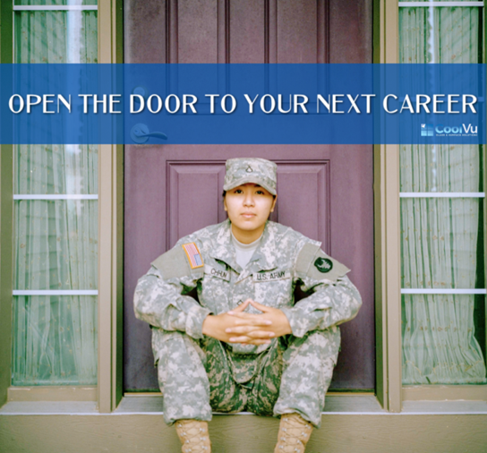 Woman wearing army fatigues sitting in front of a closed door.