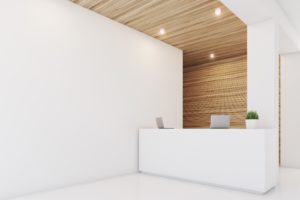 Commercial office space with a wood grain wall 