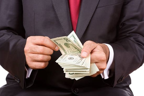 Man with lots of money Franchise Owner Salary