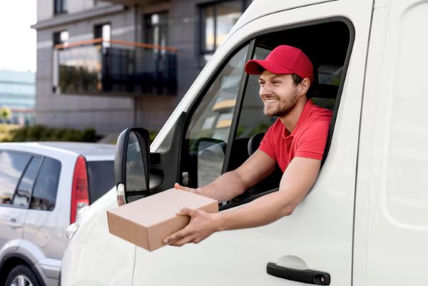 smiley-delivery-man-with-package Man doing a delivery